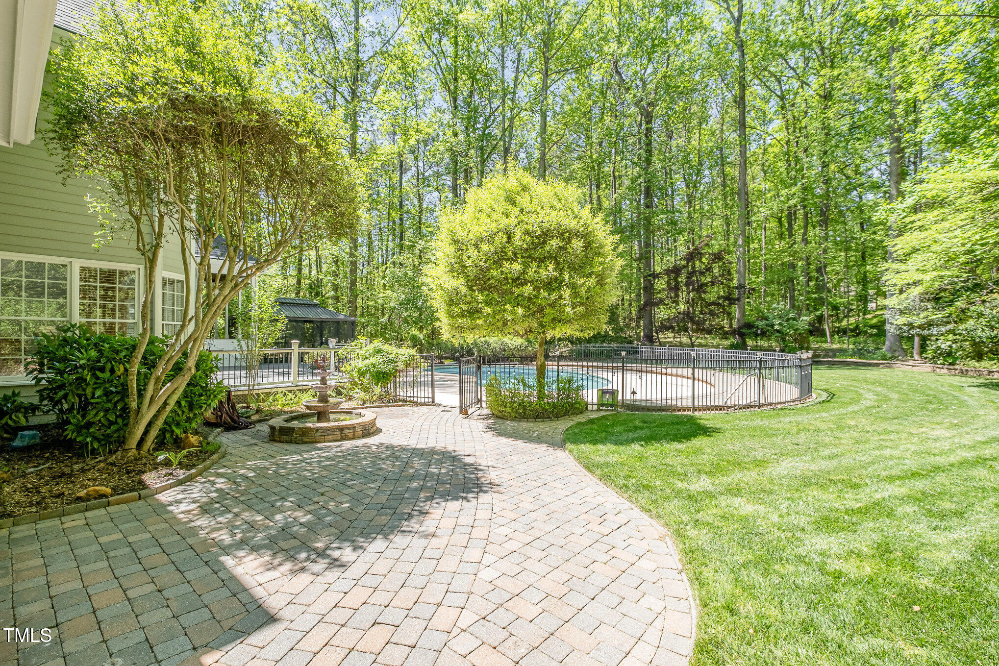 5912 Weather Rock Court Raleigh, NC 27613 - Photo 42 of 50 a view of a swimming pool with a patio