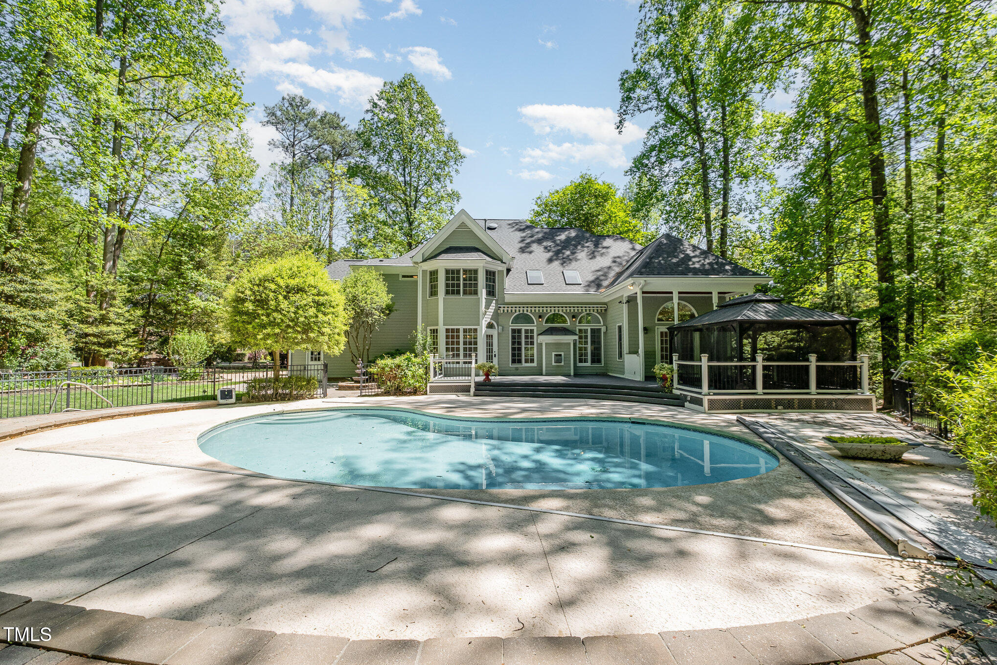 5912 Weather Rock Court Raleigh, NC 27613 - Photo 46 of 50 a view of a house with a yard and sitting area