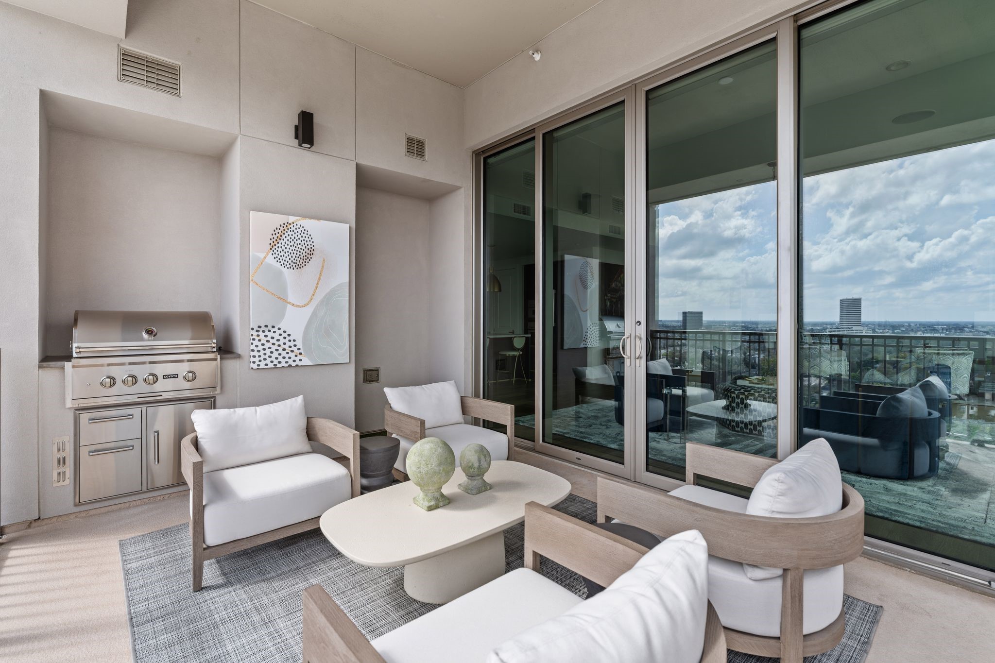 5656 San Felipe Street, Unit 1401 Houston, TX 77056 - Photo 28 of 40 A true extension of the interior’s grand scale. This balcony isn't just an accent; it’s a destination. With a spacious footprint large enough for a summer kitchen and comfortable seating, it’s the ultimate venue for sunset cocktails and moonlit dinners. Above the noise and among the stars, it’s a sanctuary where the city lights are the only guest list you need.