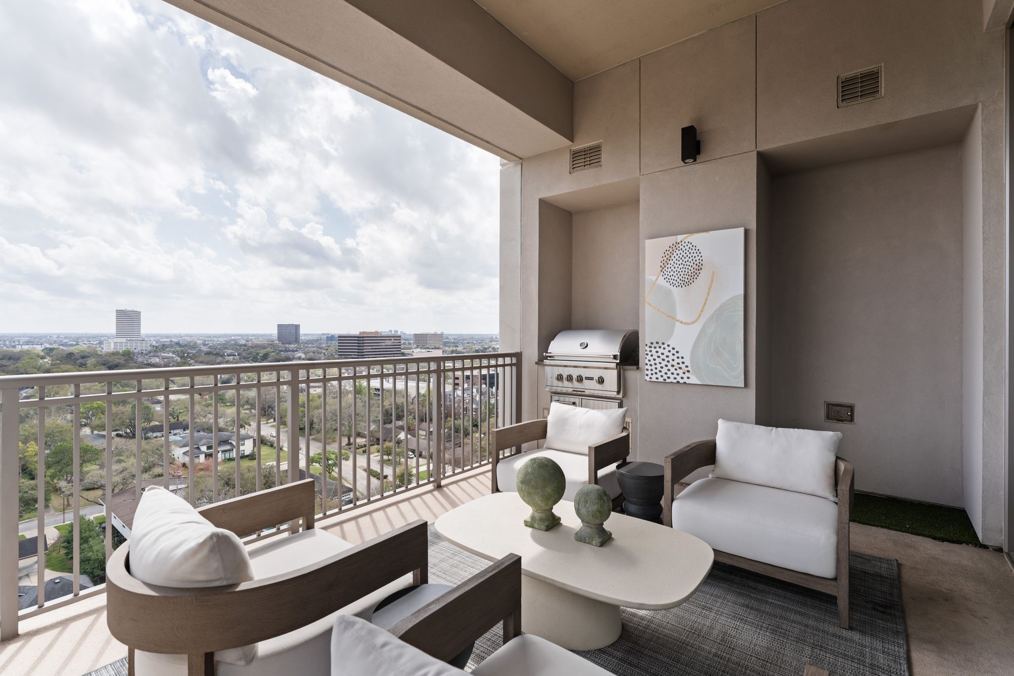 5656 San Felipe Street, Unit 1401 Houston, TX 77056 - Photo 31 of 40 a balcony with furniture and a potted plant