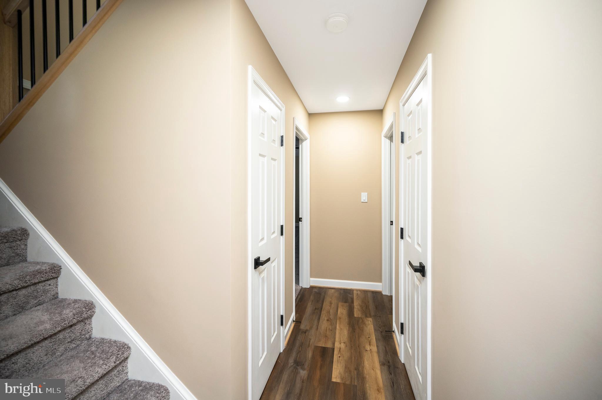 13452 Post Oak Road Spotsylvania, VA 22551 - Photo 49 of 56 a view of a hallway with wooden floor and entryway