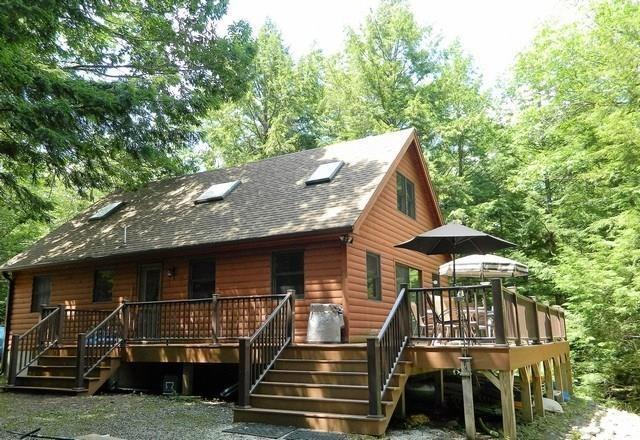 38-40 Blackberry Estates Rome, ME 04963 - Photo 2 of 23 Long Pond cottage featruing 305'+/-...