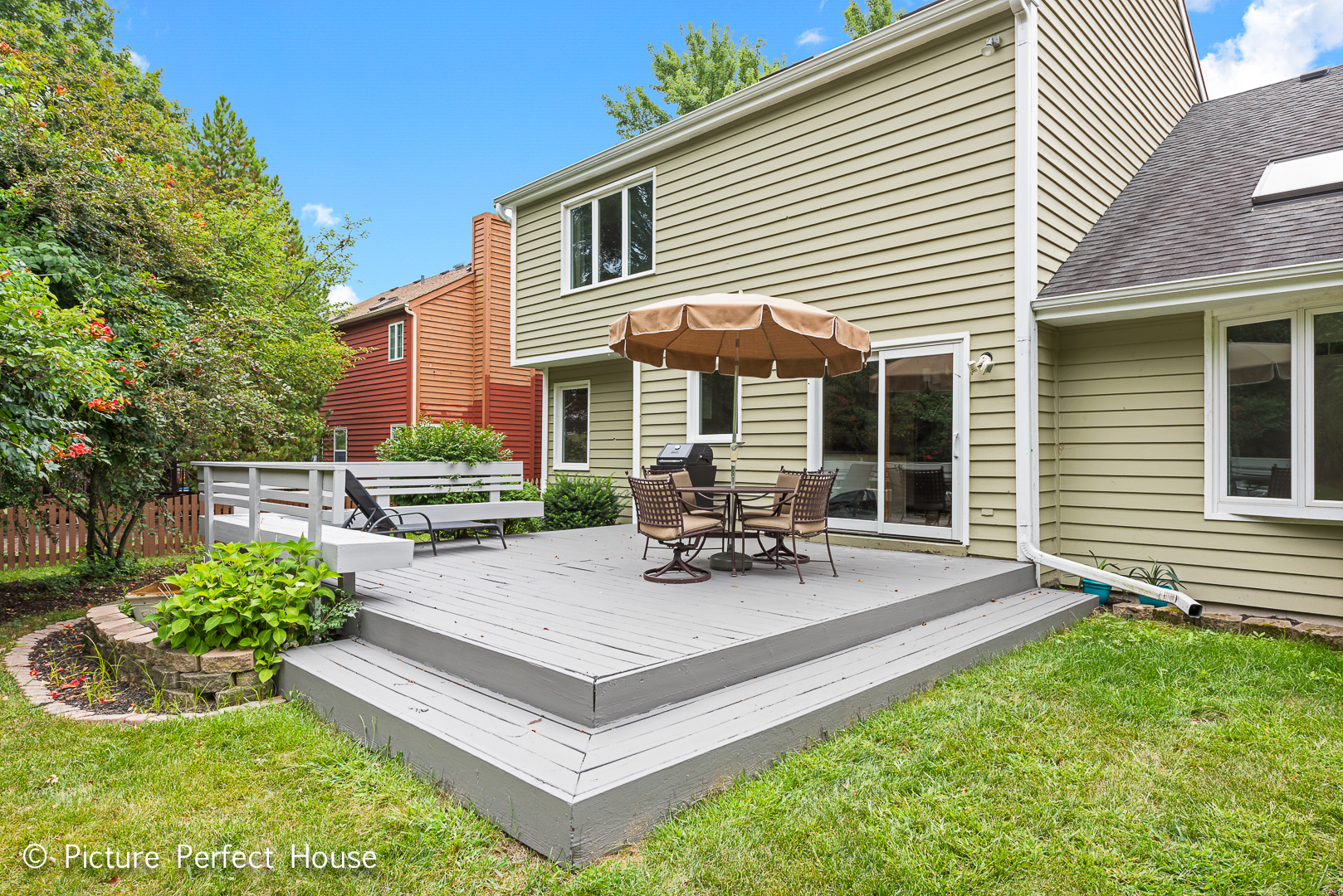 1235 Leverenz Road Naperville, IL 60564 - Photo 22 of 25 a view of a house with backyard and sitting area