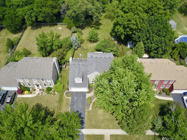 1235 Leverenz Road Naperville, IL 60564 - Photo 23 of 25 an aerial view of a house with a yard basket ball court and outdoor seating