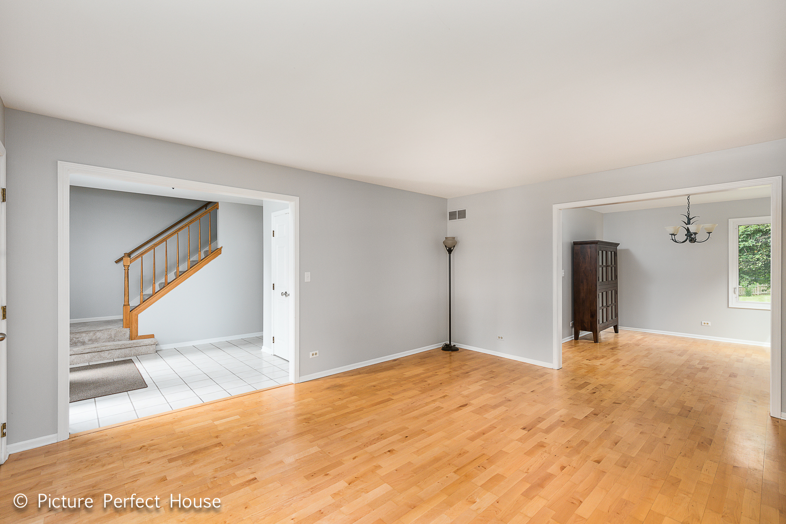 1235 Leverenz Road Naperville, IL 60564 - Photo 6 of 25 a view of empty room with wooden floor