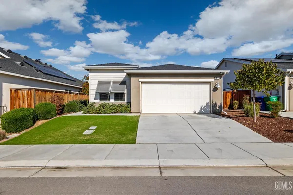 a house view with a garden space