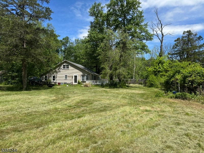 213 Liberty Corner Road Bernards, NJ 07931 - Photo 1 of 24 a front view of house with garden