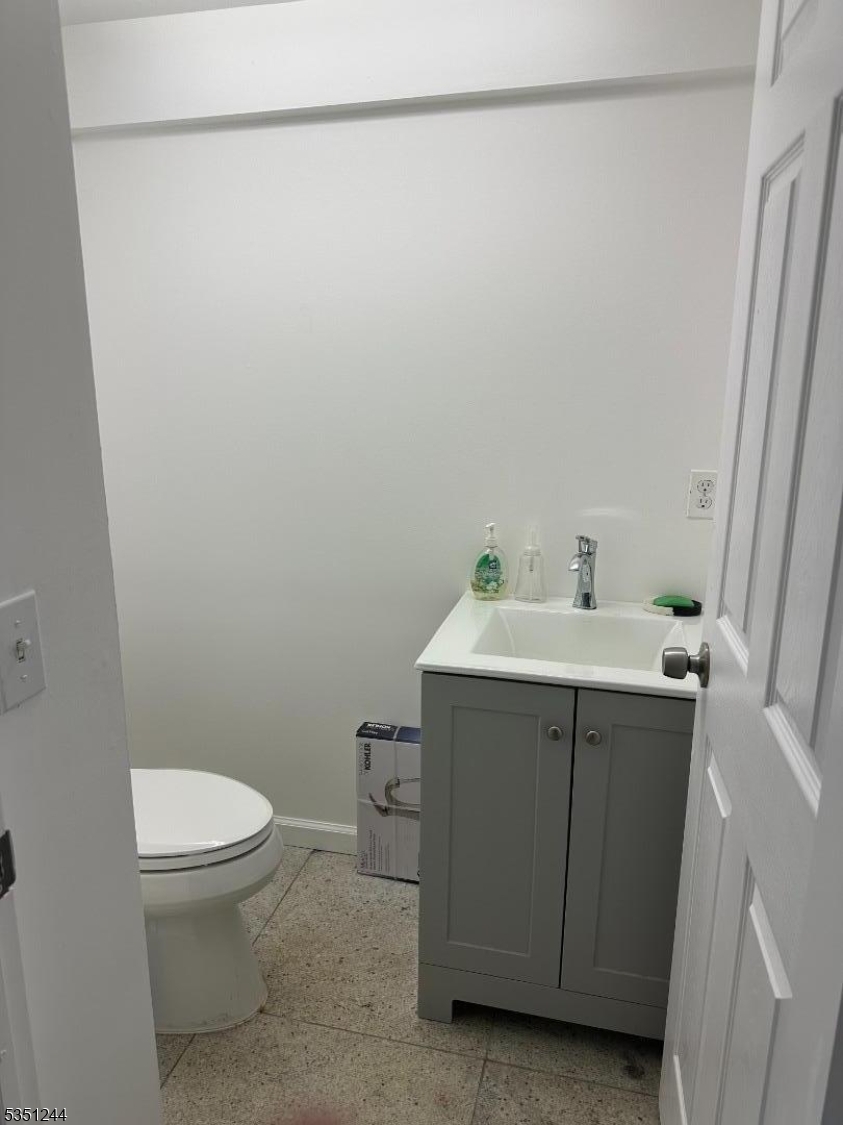 213 Liberty Corner Road Bernards, NJ 07931 - Photo 15 of 24 a bathroom with a sink a toilet and a shower
