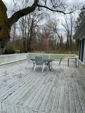 a view of roof deck with patio