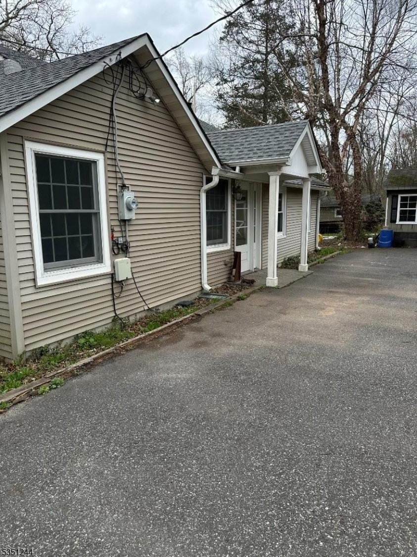 213 Liberty Corner Road Bernards, NJ 07931 - Photo 2 of 24 a view of a house with a yard