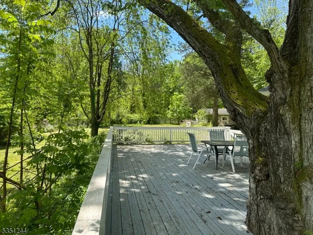 a view of a bench with wooden floor