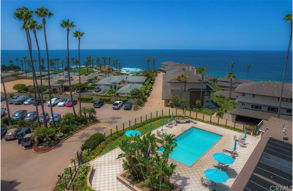 3 Blue Lagoon Laguna Beach, CA 92651 - Photo 29 of 32 a view of a terrace with couches and potted plants