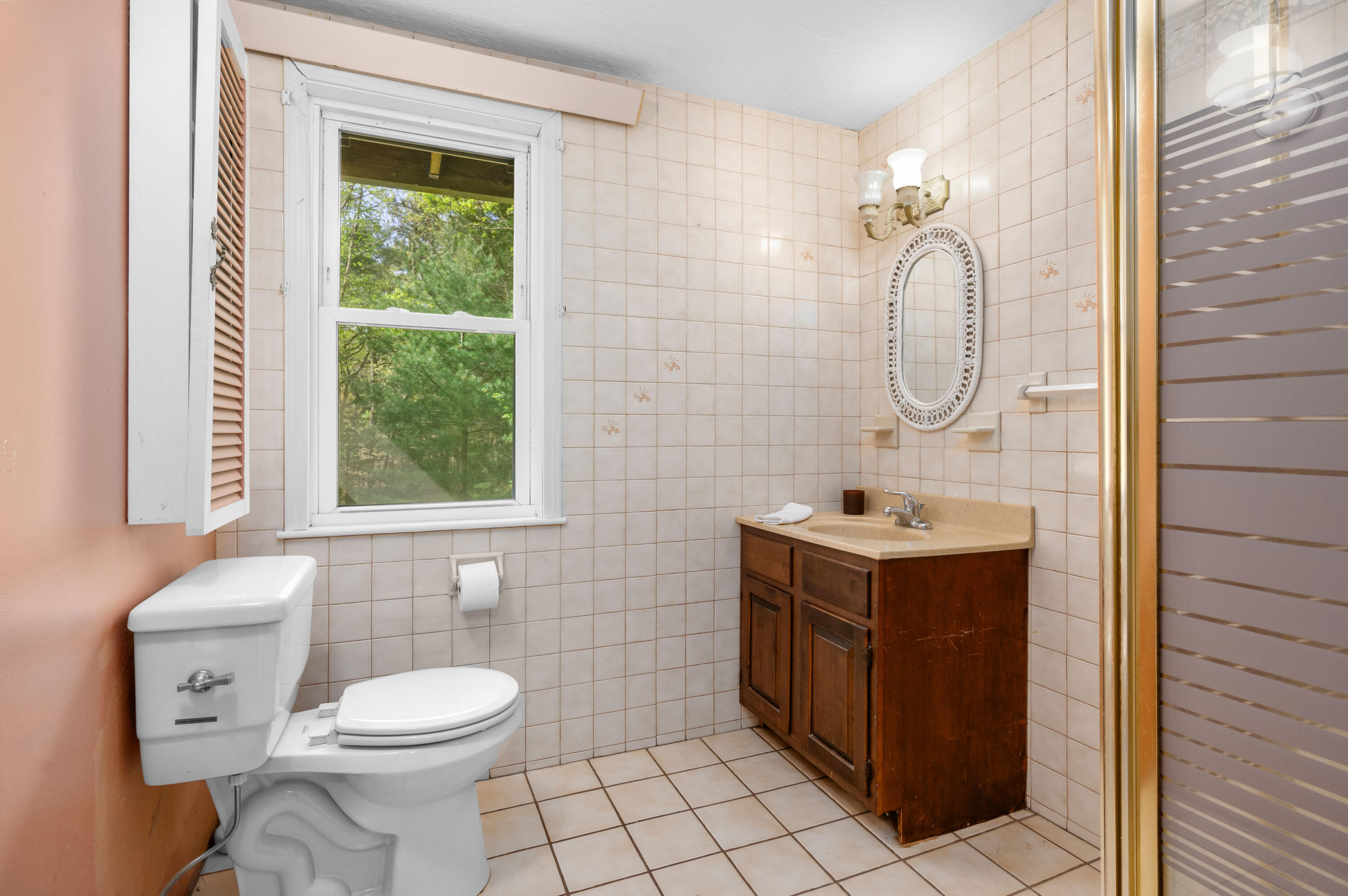 80 J B Drive Marstons Mills, MA 02648 - Photo 11 of 27 a bathroom with a granite countertop sink toilet and shower