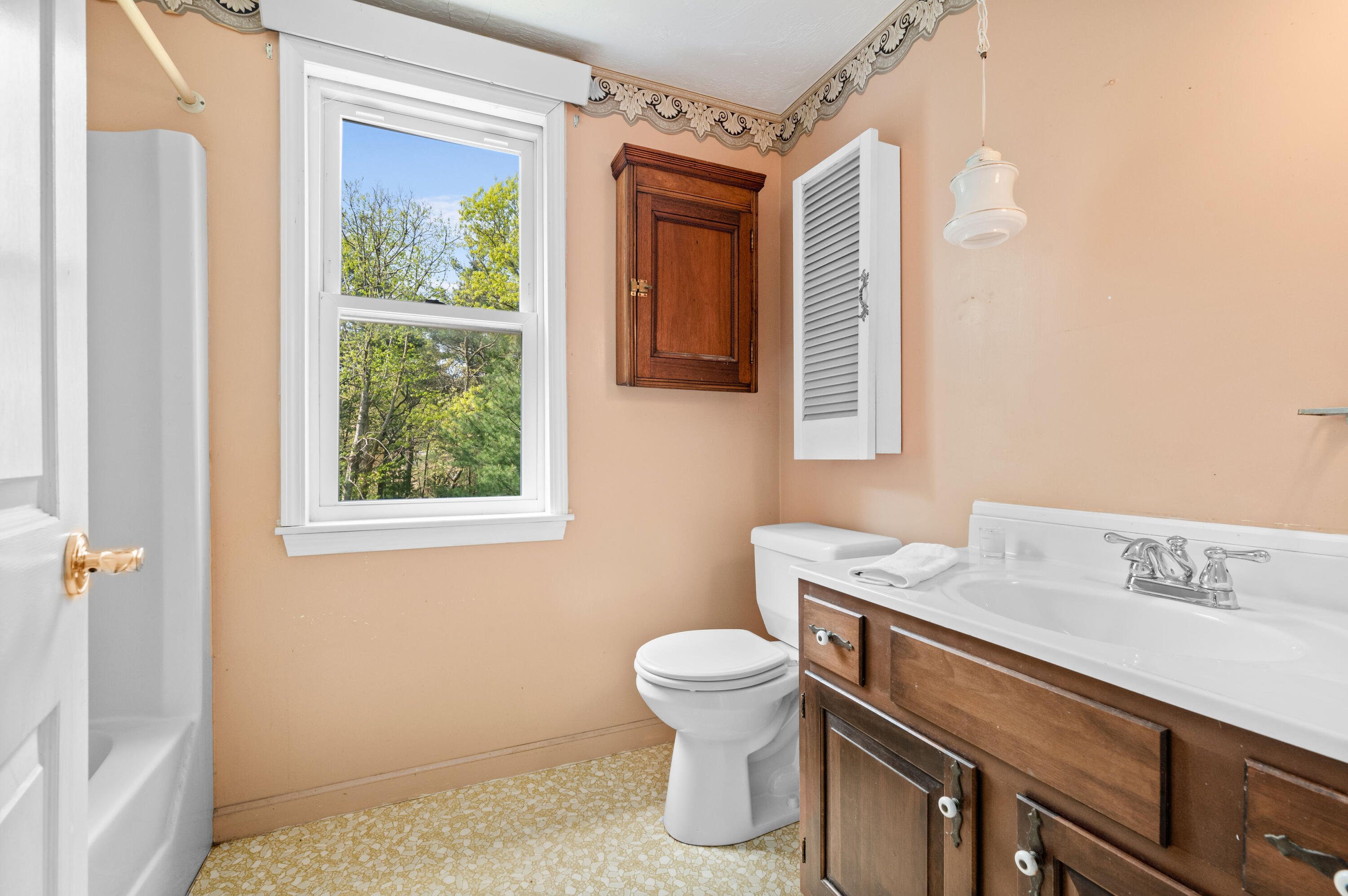 80 J B Drive Marstons Mills, MA 02648 - Photo 14 of 27 a bathroom with a sink a toilet and a window