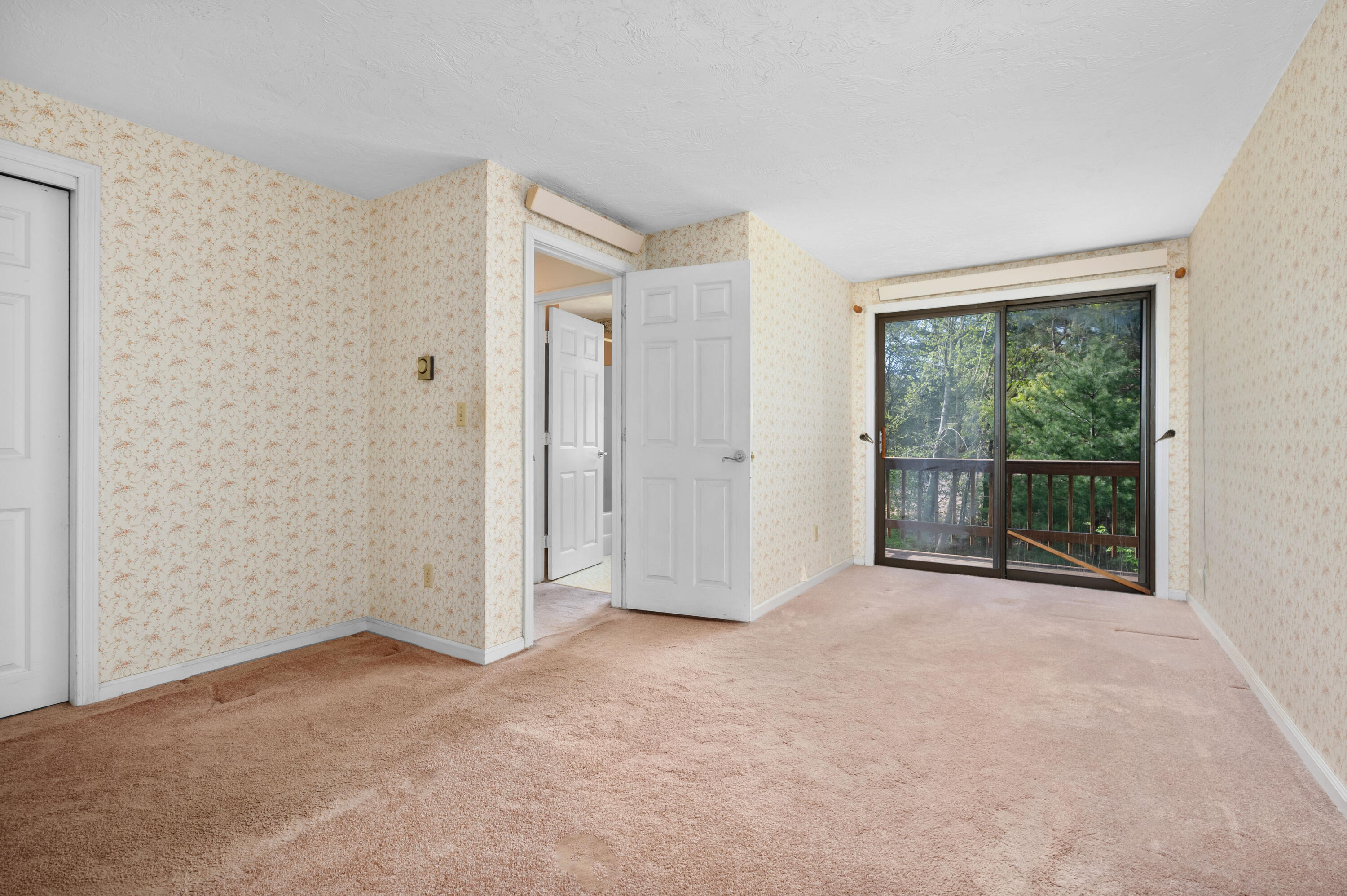 80 J B Drive Marstons Mills, MA 02648 - Photo 15 of 27 a view of an empty room with glass door