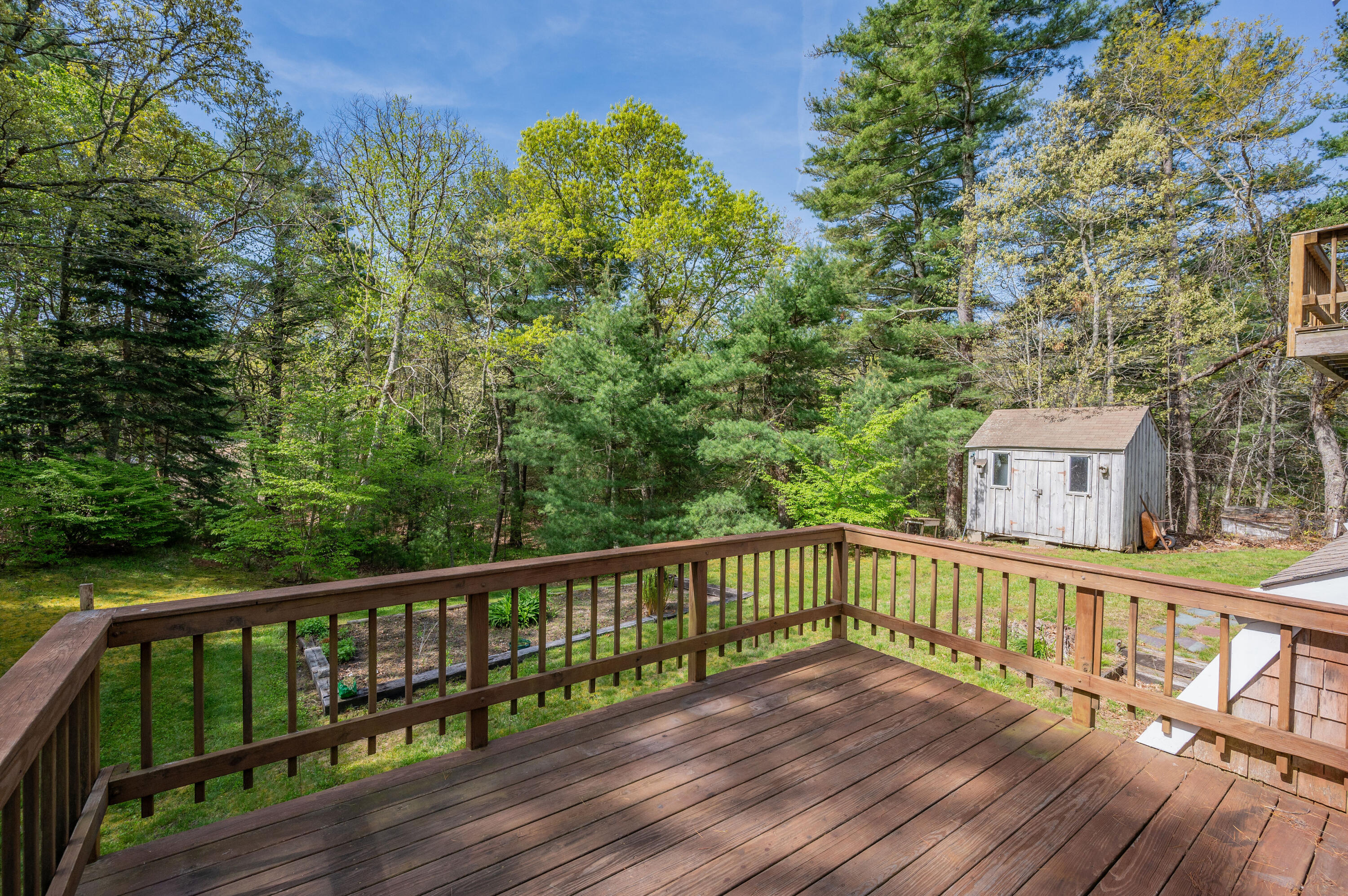 80 J B Drive Marstons Mills, MA 02648 - Photo 22 of 27 a view of a wooden roof deck