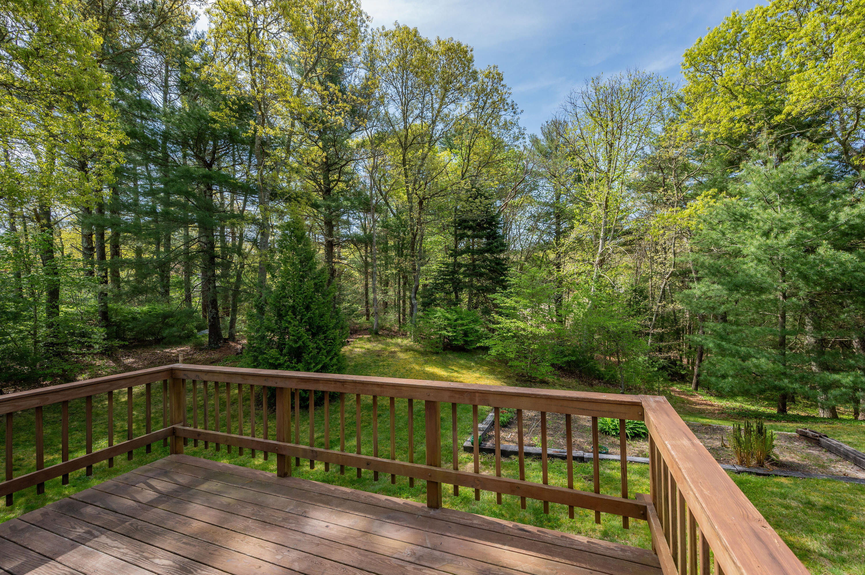 80 J B Drive Marstons Mills, MA 02648 - Photo 23 of 27 a view of balcony with deck and trees