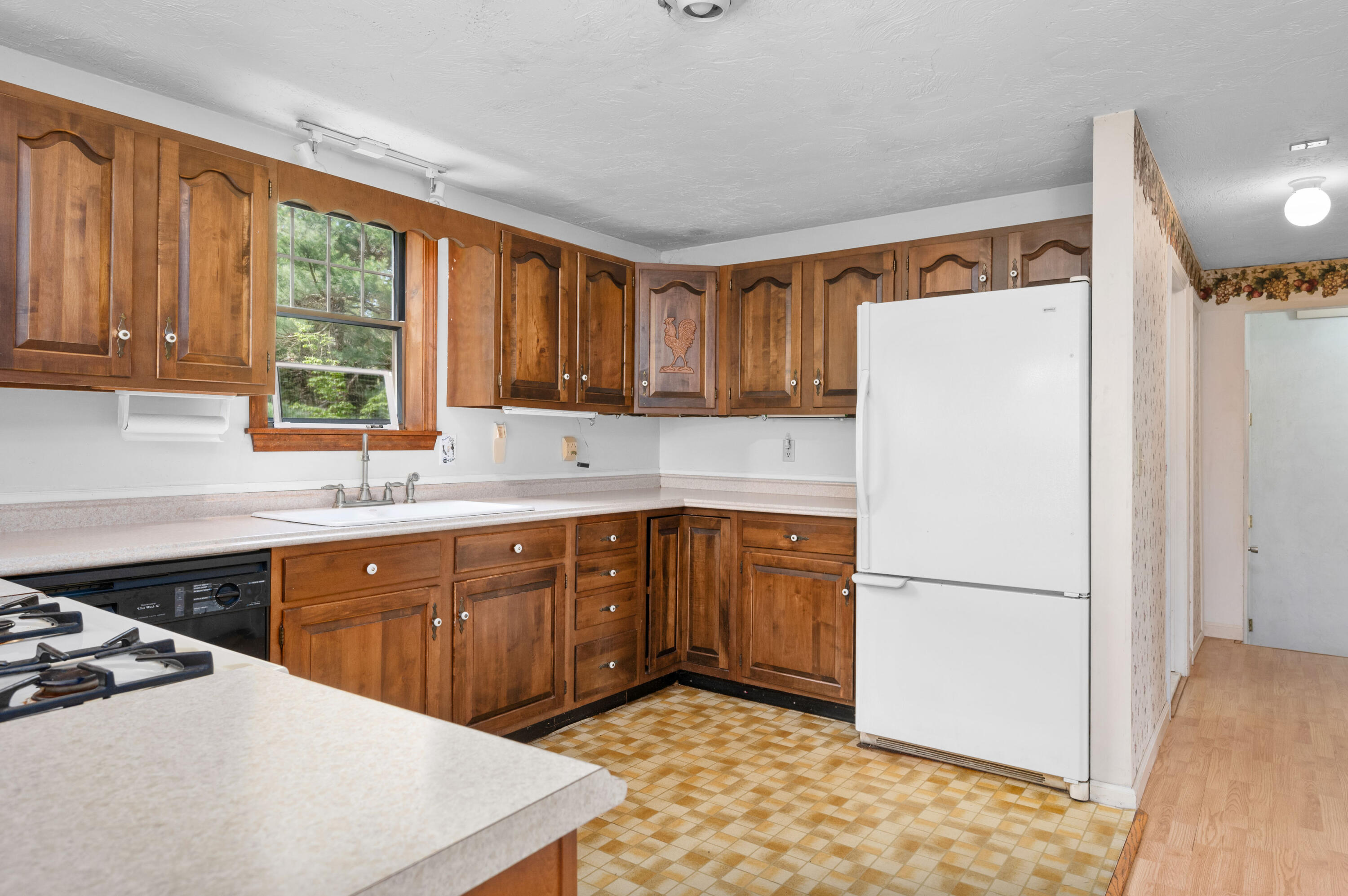 80 J B Drive Marstons Mills, MA 02648 - Photo 6 of 27 a kitchen with a refrigerator sink and cabinets