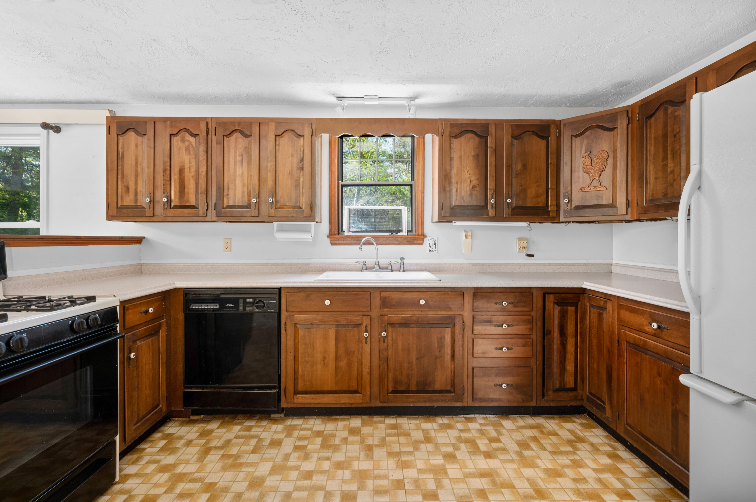 80 J B Drive Marstons Mills, MA 02648 - Photo 8 of 27 a kitchen with stainless steel appliances granite countertop a sink stove and cabinets