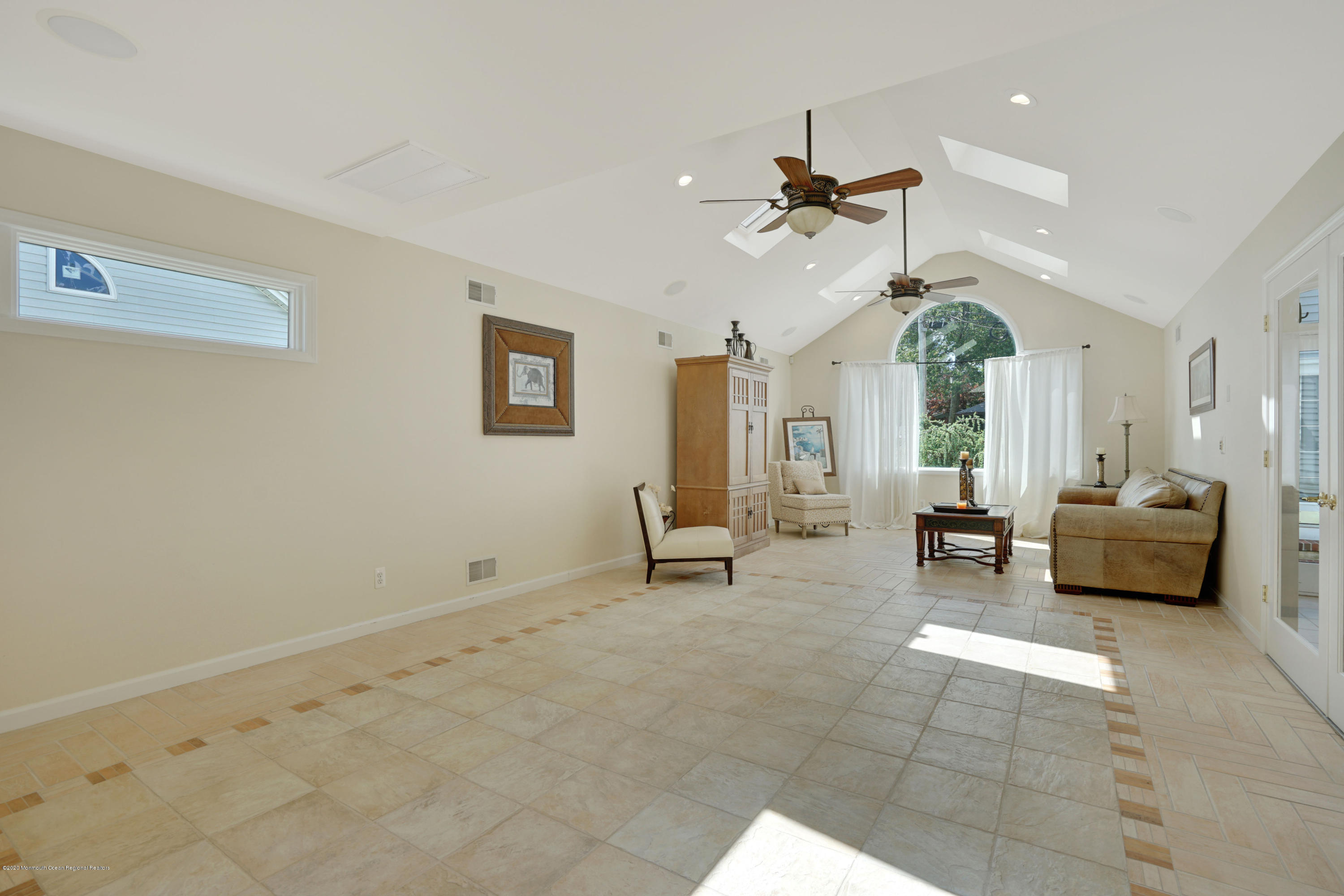 11 Metedeconk Road Brick, NJ 08723 - Photo 13 of 99 a living room with furniture and a chandelier