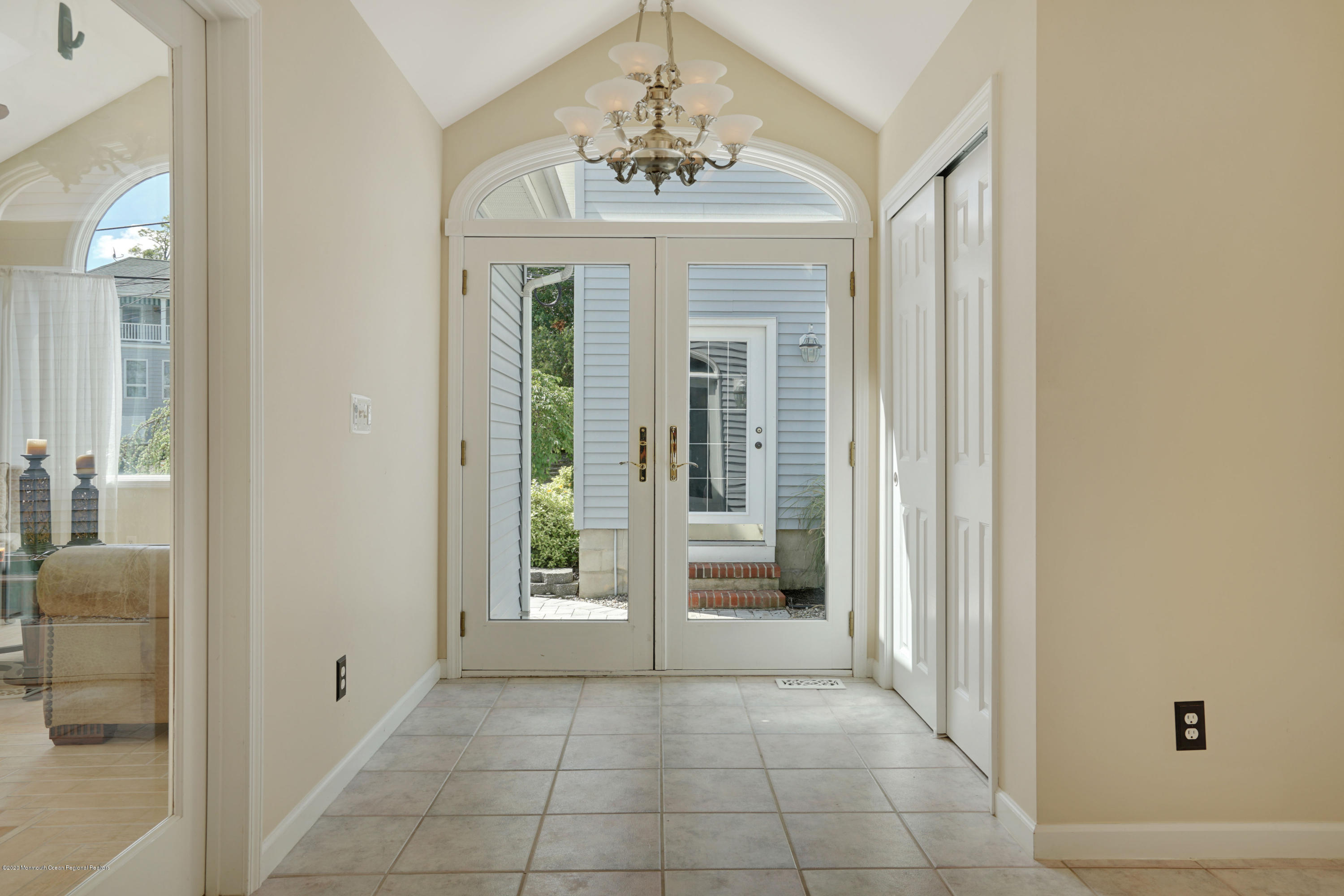 11 Metedeconk Road Brick, NJ 08723 - Photo 2 of 99 a view of a hallway with windows and entryway