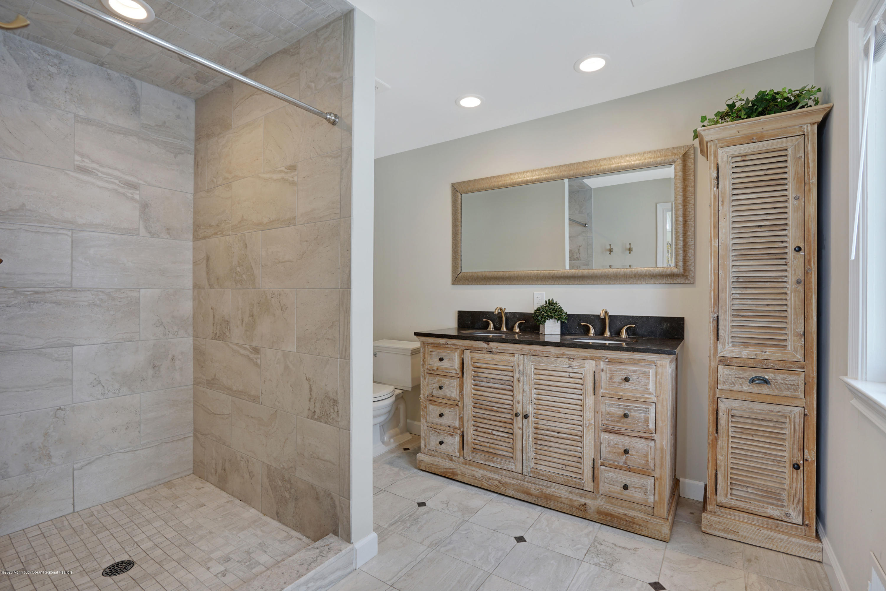 11 Metedeconk Road Brick, NJ 08723 - Photo 36 of 99 a bathroom with a granite countertop sink a vanity and a shower