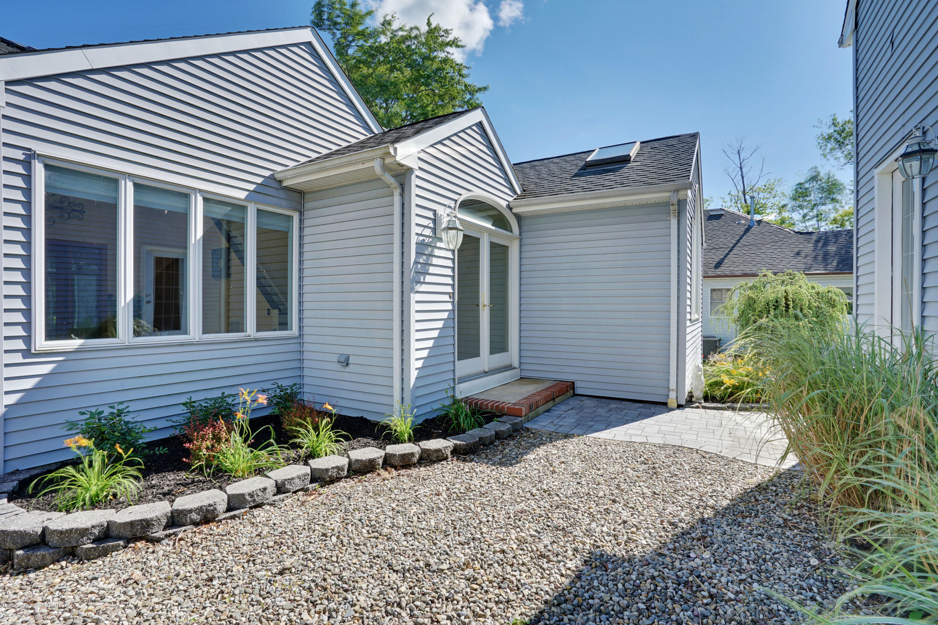 11 Metedeconk Road Brick, NJ 08723 - Photo 43 of 99 a front view of a house with a yard