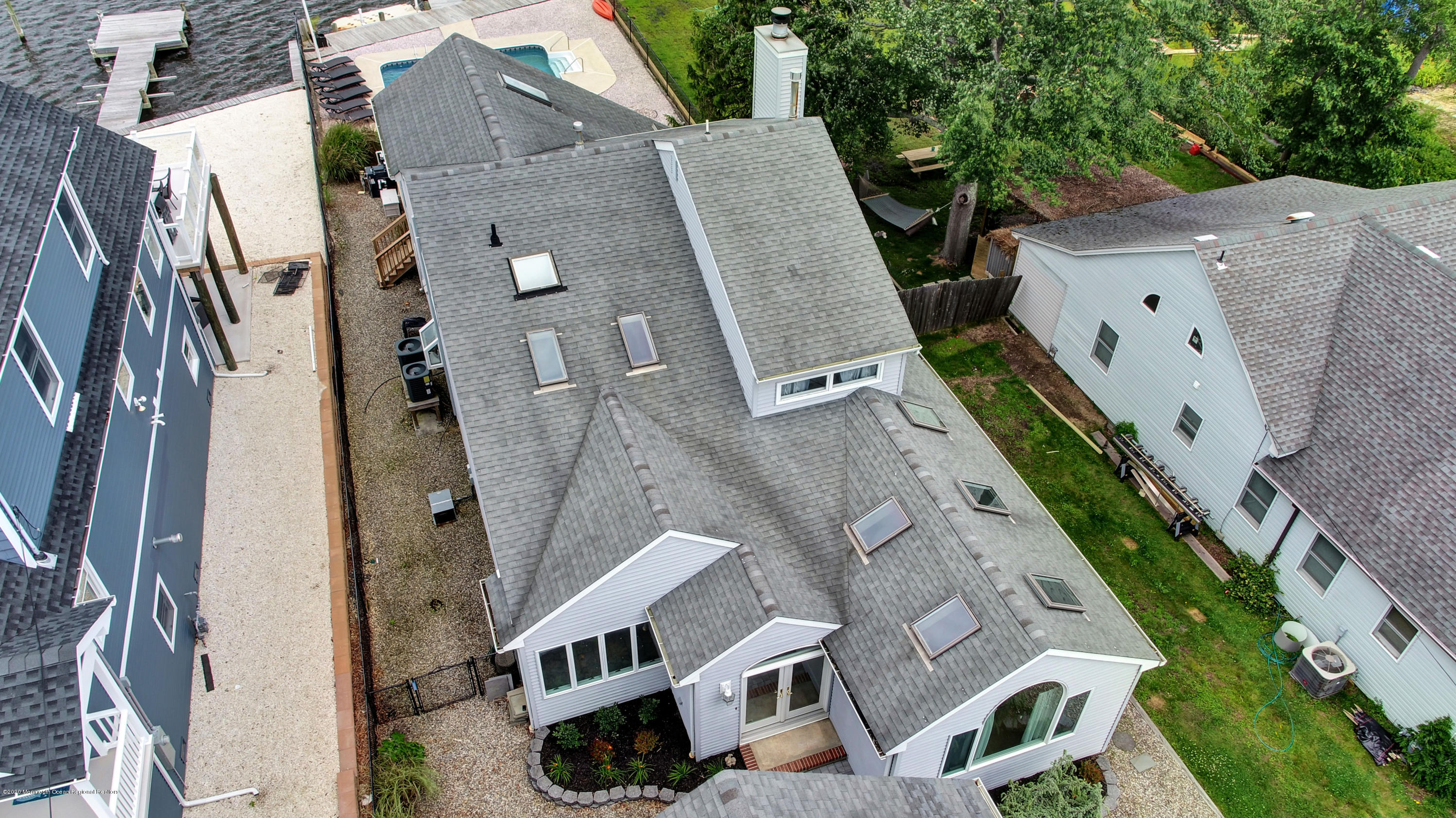 11 Metedeconk Road Brick, NJ 08723 - Photo 55 of 99 an aerial view of a house with outdoor space and parking