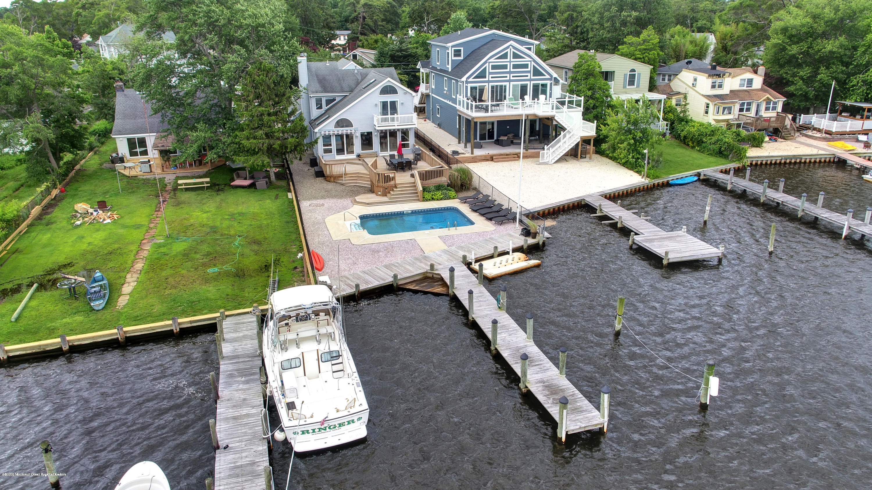 11 Metedeconk Road Brick, NJ 08723 - Photo 58 of 99 an aerial view of a house with swimming pool garden and patio