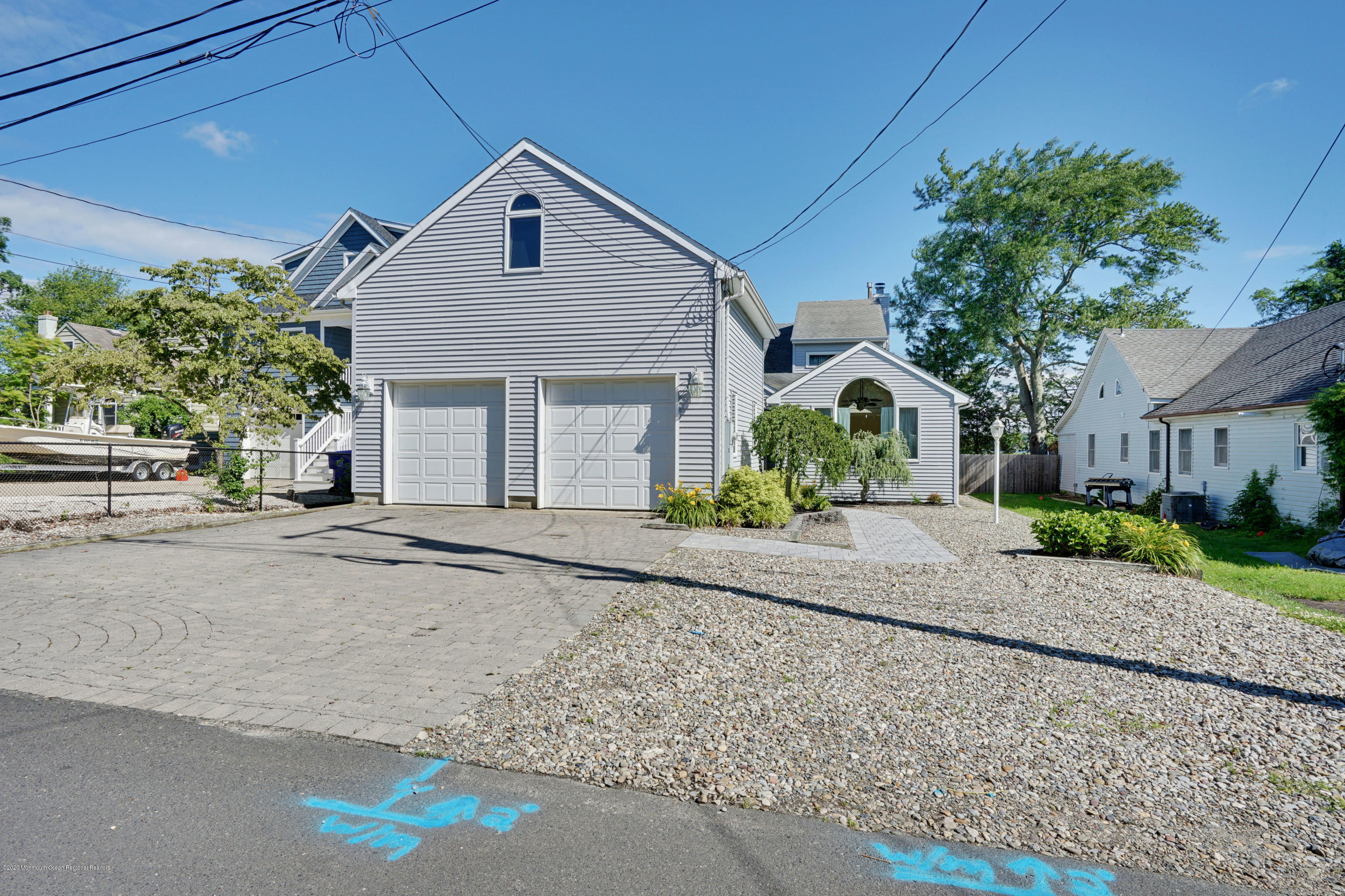 11 Metedeconk Road Brick, NJ 08723 - Photo 68 of 99 a front view of a house with garden