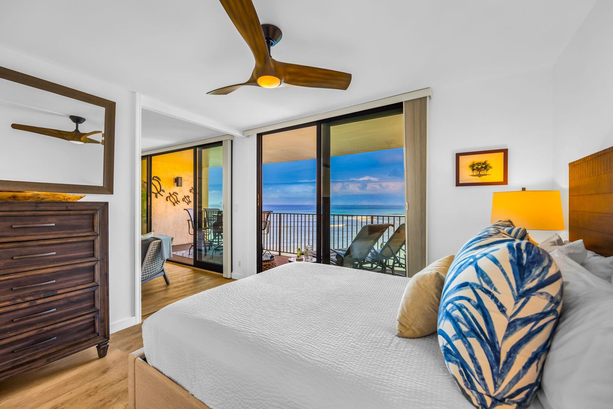 4401 Lower Honoapiilani Road, Unit B603 Lahaina, HI 96761 - Photo 17 of 41 a bedroom with a bed and a view of balcony