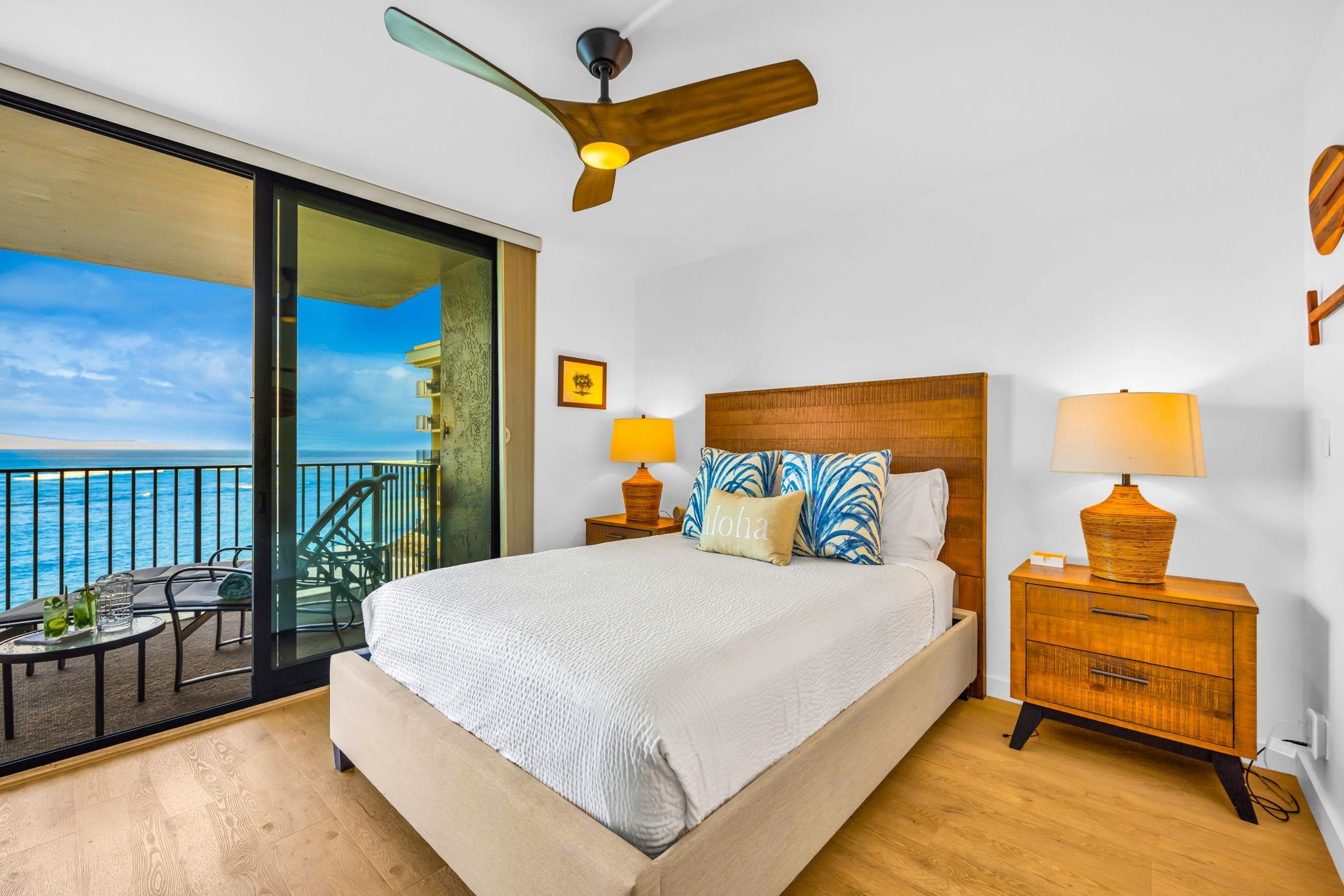 4401 Lower Honoapiilani Road, Unit B603 Lahaina, HI 96761 - Photo 19 of 41 a bedroom with a bed chair and window