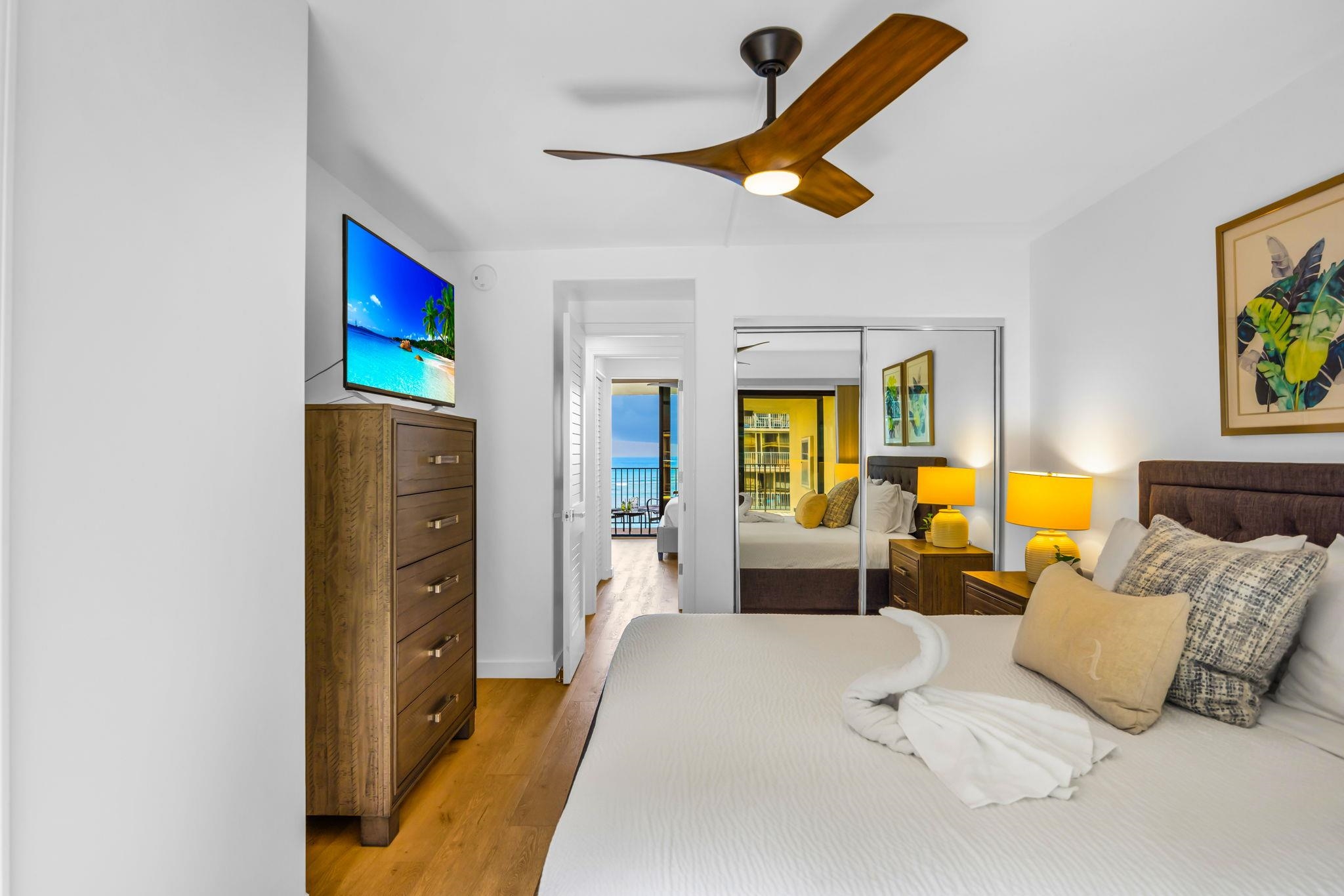 4401 Lower Honoapiilani Road, Unit B603 Lahaina, HI 96761 - Photo 24 of 41 a bedroom with furniture and a large window