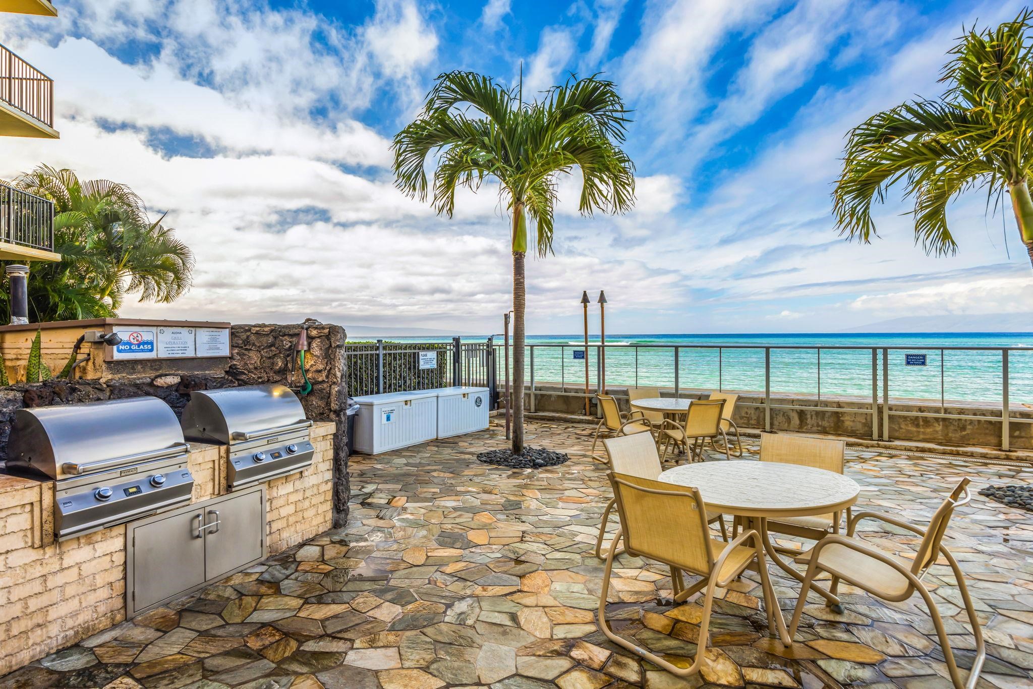 4401 Lower Honoapiilani Road, Unit B603 Lahaina, HI 96761 - Photo 29 of 41 a view of a chairs and table in the patio