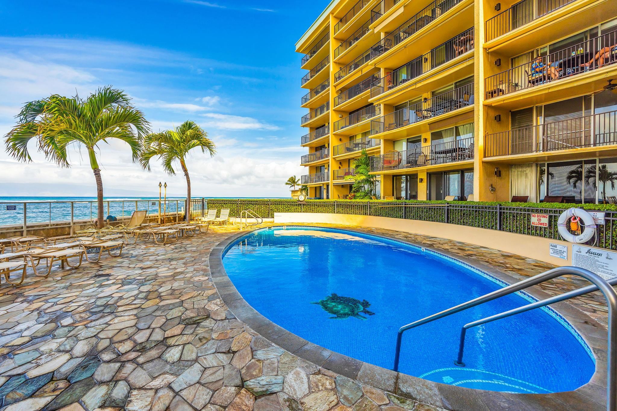 4401 Lower Honoapiilani Road, Unit B603 Lahaina, HI 96761 - Photo 31 of 41 a view of swimming pool with outdoor seating and yard