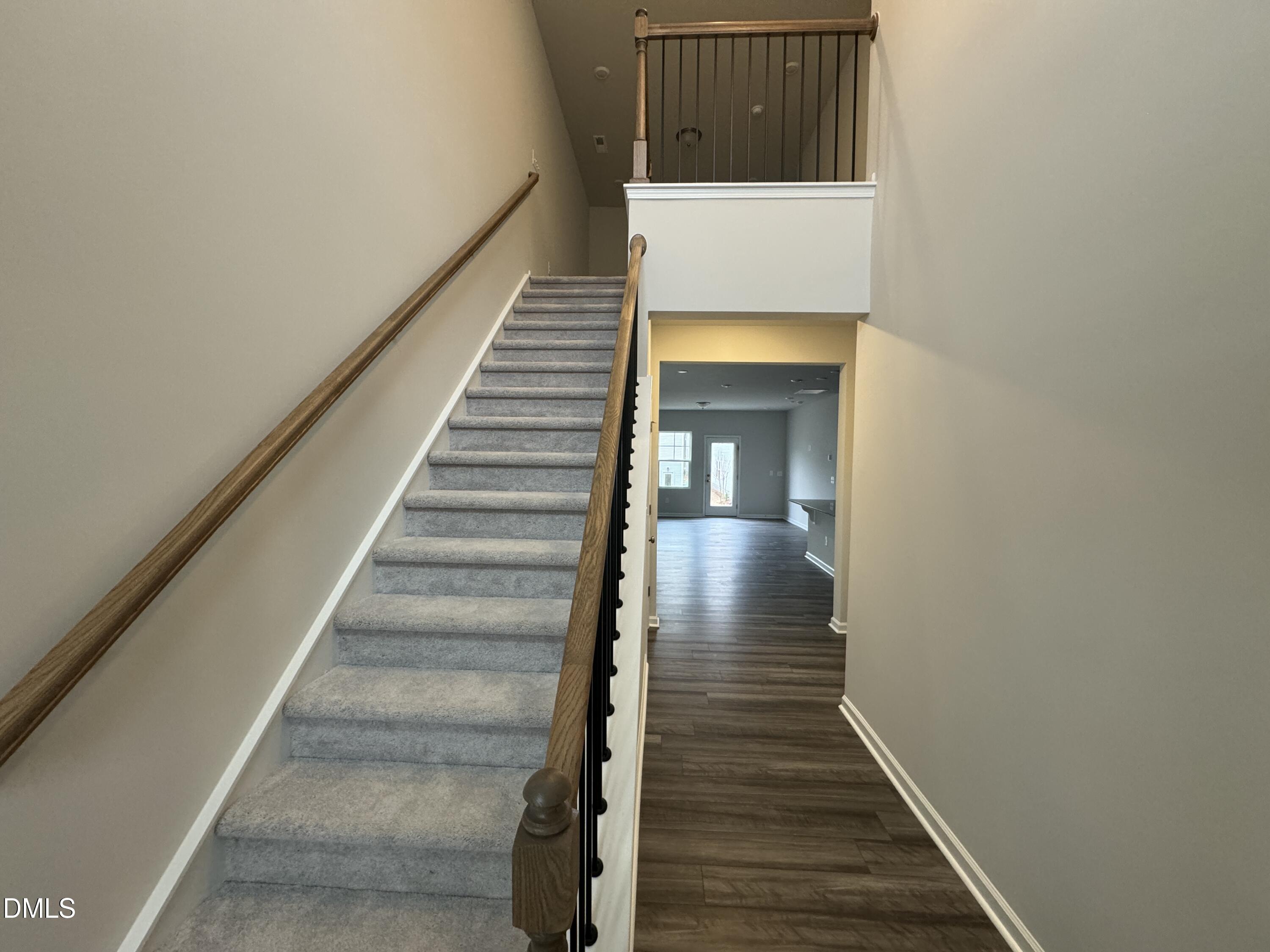 5706 Woodlawn Drive Durham, NC 27703 - Photo 2 of 20 a view of entryway and hall with wooden floor
