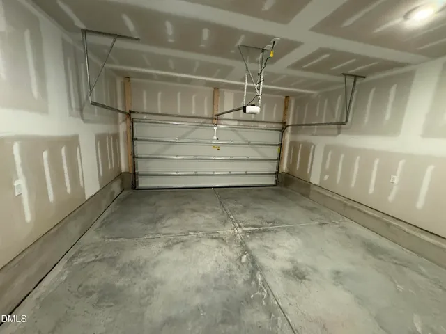 a view of an empty room with racks on the wall