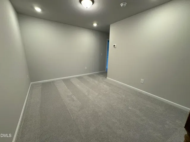 an empty room with a natural light