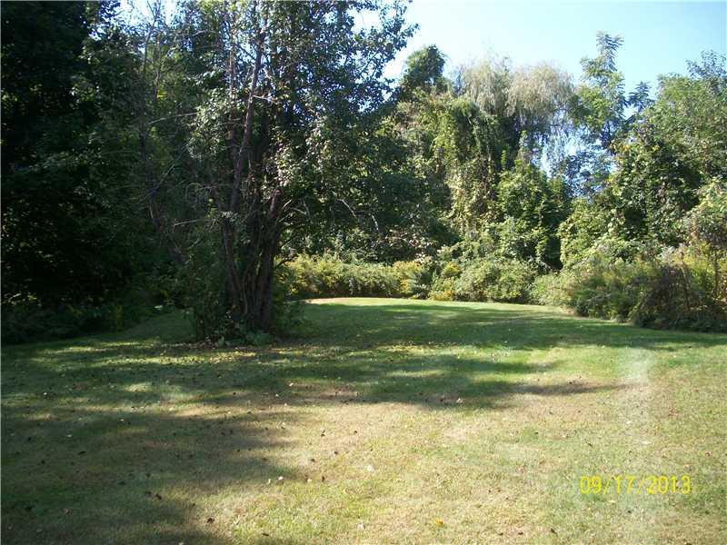 35 Organug Road York, ME 03909 - Photo 7 of 16 Exterior Front. Side yard with apple...