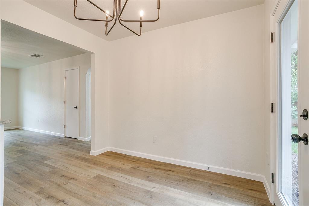 713 Vaughn Drive Burleson, TX 76028 - Photo 17 of 40 a view of small space with wooden floor