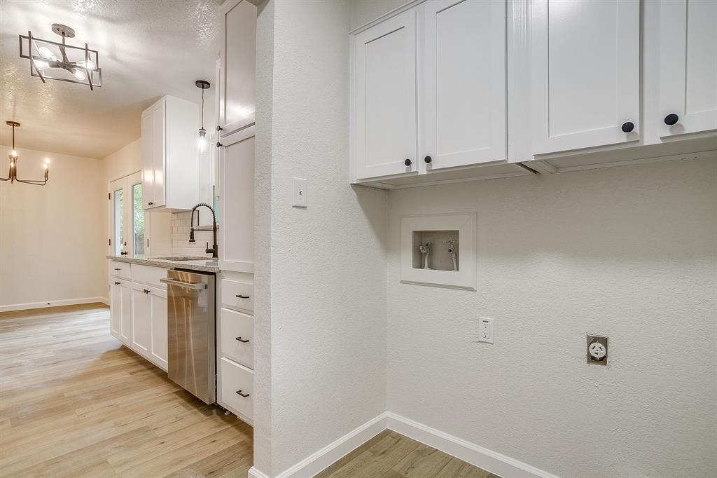 713 Vaughn Drive Burleson, TX 76028 - Photo 24 of 40 a view of a kitchen with electric appliances