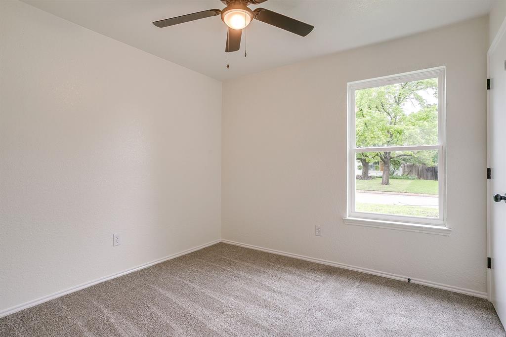 713 Vaughn Drive Burleson, TX 76028 - Photo 27 of 40 an empty room with a window