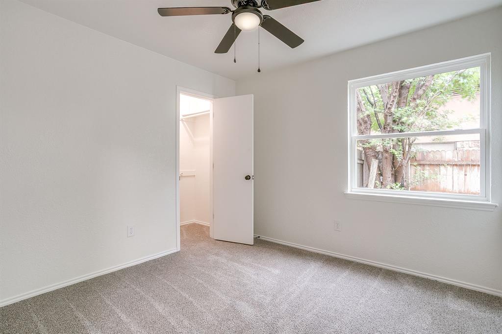 713 Vaughn Drive Burleson, TX 76028 - Photo 29 of 40 a view of an empty room with a window