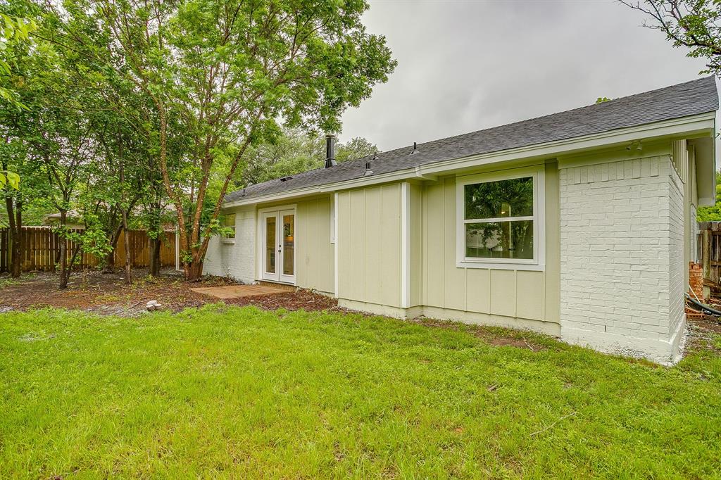713 Vaughn Drive Burleson, TX 76028 - Photo 39 of 40 front view of a house with a yard