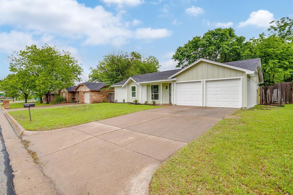 713 Vaughn Drive Burleson, TX 76028 - Photo 4 of 40 a view of outdoor space yard and garage