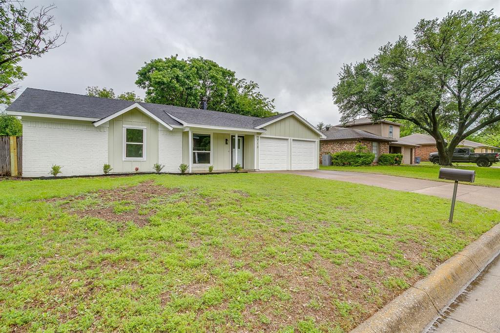 713 Vaughn Drive Burleson, TX 76028 - Photo 5 of 40 a front view of a house with yard