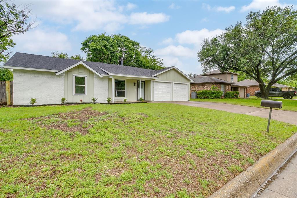 713 Vaughn Drive Burleson, TX 76028 - Photo 6 of 40 a front view of a house with yard