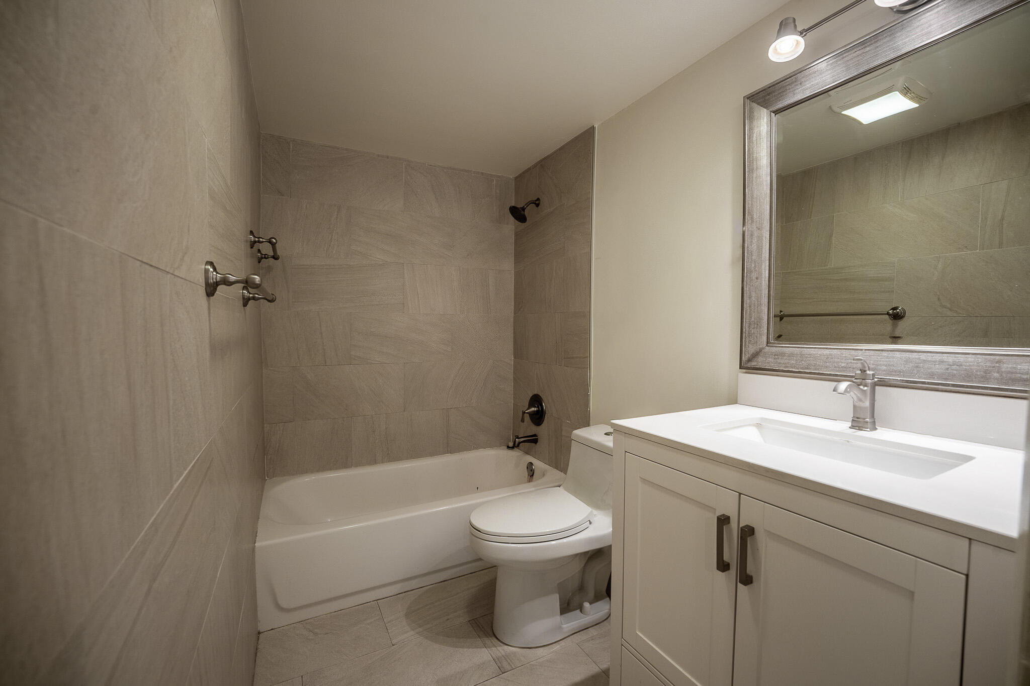 1129 Pebble Beach Lane, Unit 11 Marathon, FL 33050 - Photo 12 of 15 a bathroom with a sink a toilet and shower