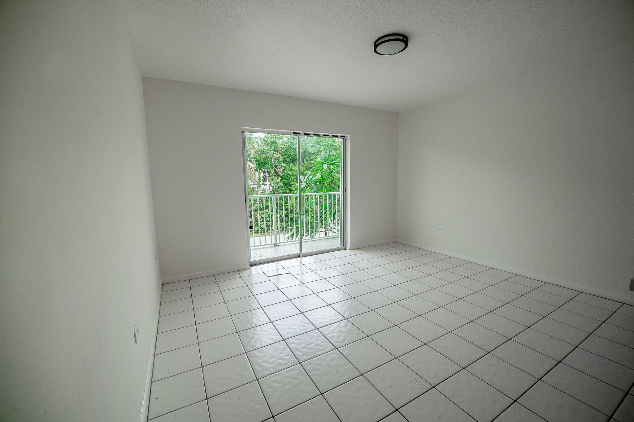 1129 Pebble Beach Lane, Unit 11 Marathon, FL 33050 - Photo 5 of 15 a view of an empty room and window