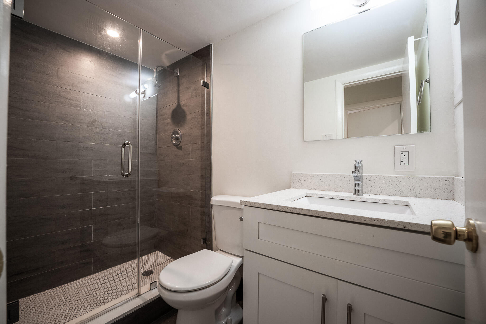 1129 Pebble Beach Lane, Unit 11 Marathon, FL 33050 - Photo 7 of 15 a bathroom with a sink toilet and shower
